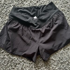 Black athletic shorts with liner and front pockets size large
